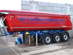 Containerbeschriftung mit blauer Folienschrift auf einem Mulde für die Container und Schüttgut Firma AS-Container in Grevenbroich Industriegebiet.